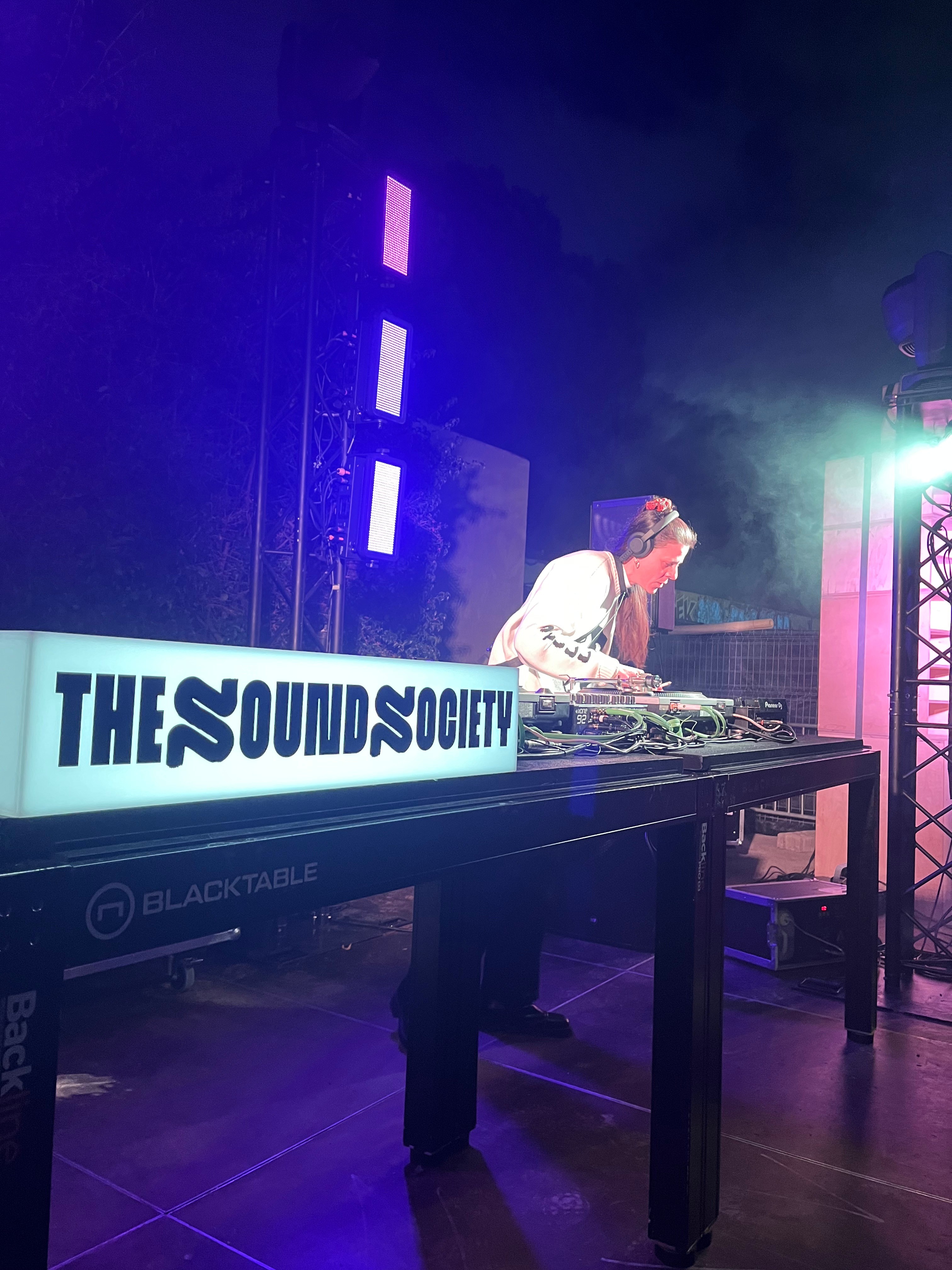 Woman gazing through two glasses of water